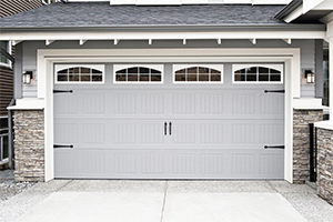 it's a garage door / nothing less and nothing more / than a garage door